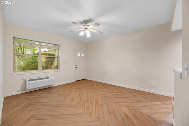 630 NE Adwick Dr, Hillsboro, OR 97006 - entrance foyer with a ceiling fan, baseboards, and a wall mounted air conditioner