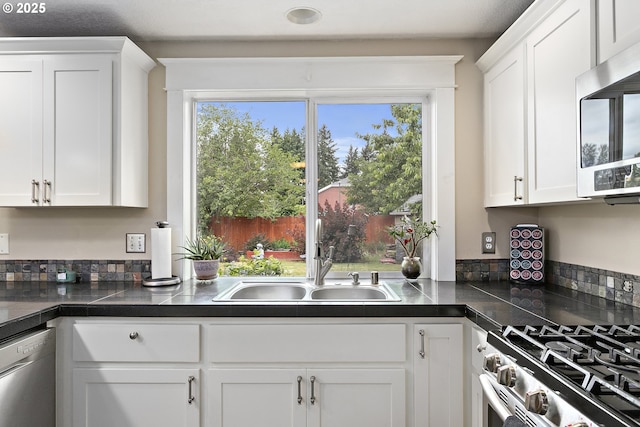 16506 NE 13th St, Vancouver, WA 98684 - kitchen with stainless steel appliances, white cabinets, and plenty of natural light