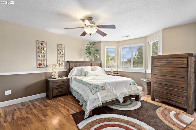 16506 NE 13th St, Vancouver, WA 98684 - bedroom with wood finished floors, a textured ceiling, and a ceiling fan