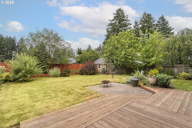 16506 NE 13th St, Vancouver, WA 98684 - wooden deck with a fenced backyard, an outdoor fire pit, and an outdoor structure