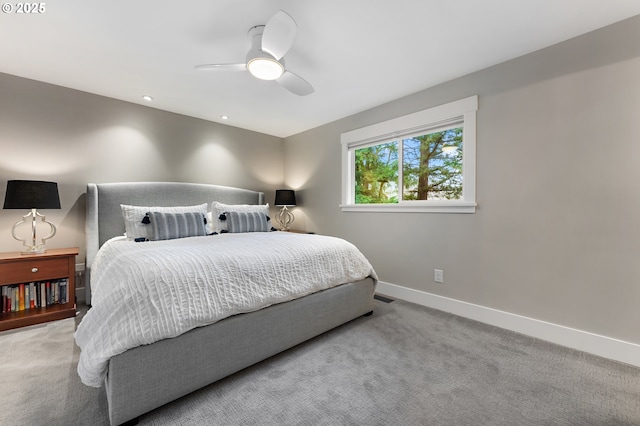 carpeted bedroom with recessed lighting, a ceiling fan, and baseboards