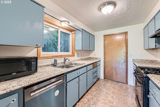 121 SE 34th Cir, Troutdale, OR 97060 - kitchen featuring black appliances, a textured ceiling, blue cabinetry, and light countertops