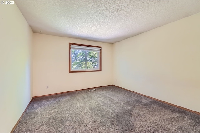 121 SE 34th Cir, Troutdale, OR 97060 - empty room with carpet flooring and a textured ceiling