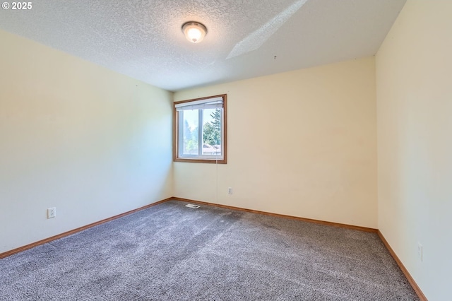 121 SE 34th Cir, Troutdale, OR 97060 - carpeted empty room with a textured ceiling and baseboards