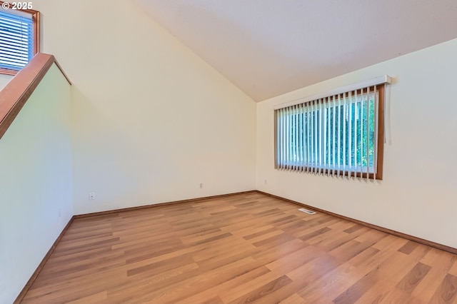 121 SE 34th Cir, Troutdale, OR 97060 - empty room featuring light wood finished floors and high vaulted ceiling