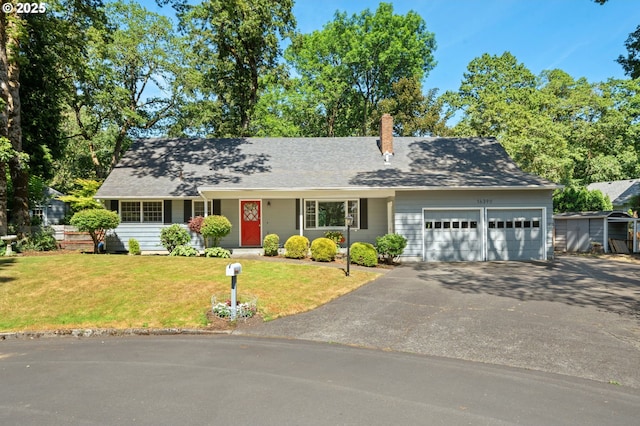 16390 SE Hillside Ln, Milwaukie, OR 97267 - view of front of property featuring an attached garage, asphalt driveway, a front yard, a chimney, and a storage shed