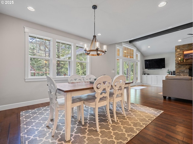 dining space featuring dark wood-type flooring, recessed lighting, baseboards, a chandelier, and vaulted ceiling with beams