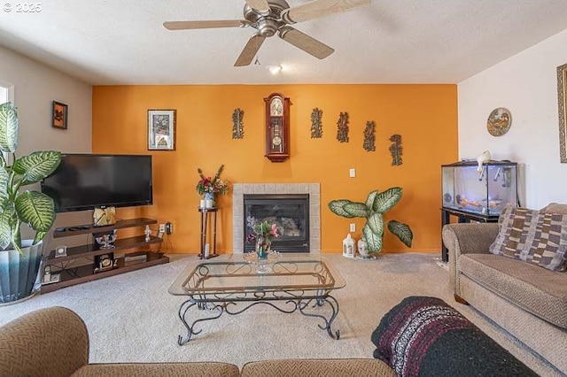 1227 Trent Ave, Keizer, OR 97303 - carpeted living room with ceiling fan and a fireplace