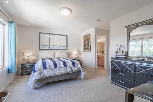 1227 Trent Ave, Keizer, OR 97303 - carpeted bedroom with baseboards and connected bathroom