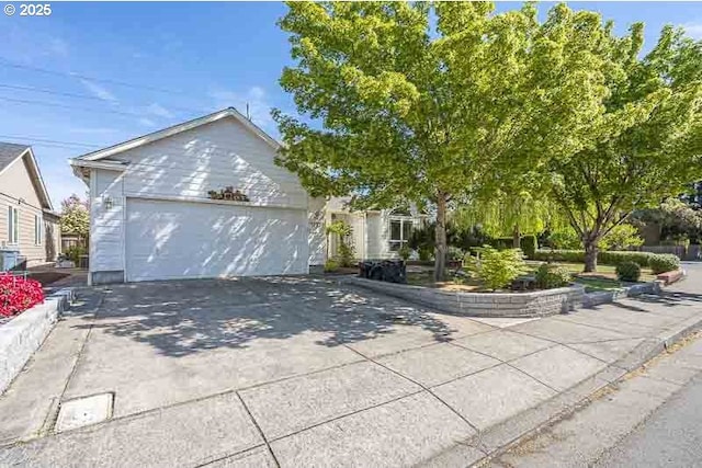 1227 Trent Ave, Keizer, OR 97303 - view of front of home with concrete driveway and a garage