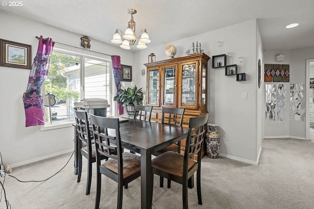 1227 Trent Ave, Keizer, OR 97303 - dining room with a chandelier, light carpet, and baseboards