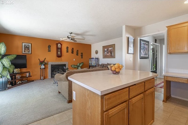 1227 Trent Ave, Keizer, OR 97303 - kitchen with open floor plan, light tile patterned floors, ceiling fan, and light countertops