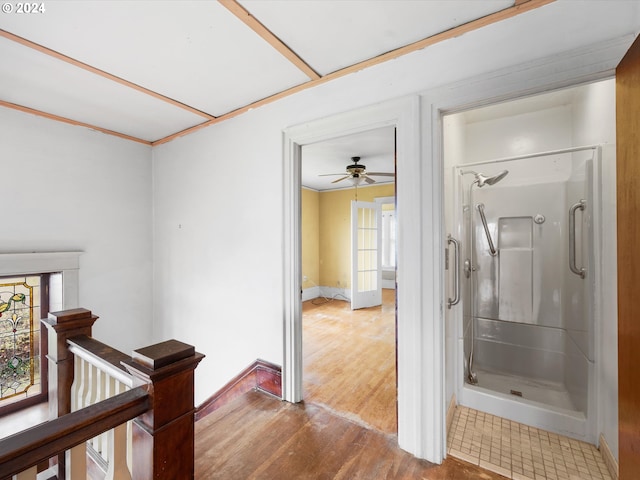 corridor featuring crown molding and hardwood / wood-style floors