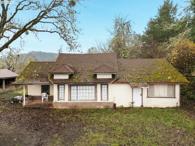 rear view of house with a patio area