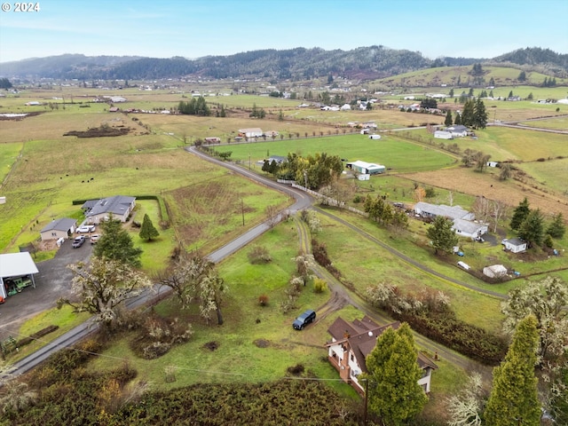 birds eye view of property featuring a rural view