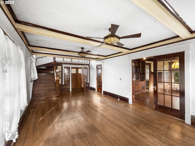 unfurnished living room with dark hardwood / wood-style flooring, crown molding, french doors, and ceiling fan