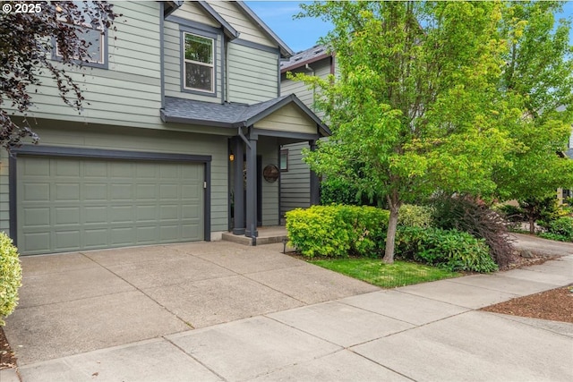 2839 25th Ave, Forest Grove, OR 97116 - view of front facade with a garage, concrete driveway, and roof with shingles