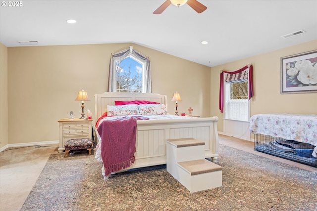 bedroom featuring ceiling fan and dark carpet