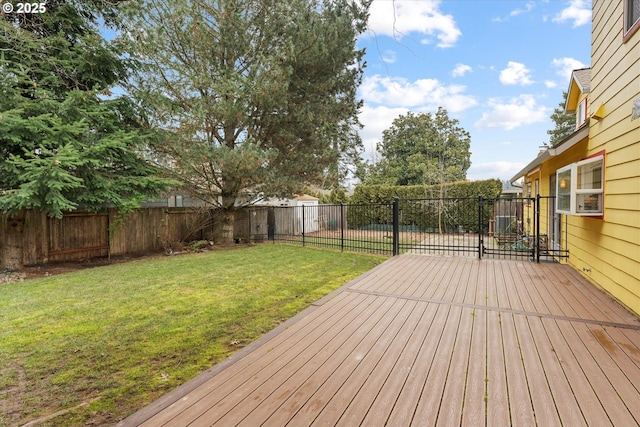 wooden terrace with a lawn