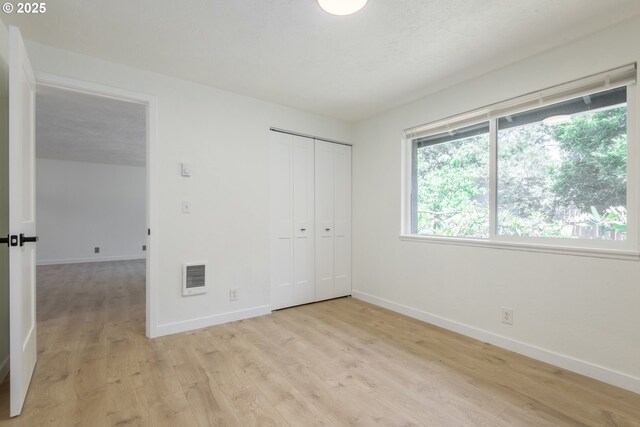 2817 Applewood Ln, Eugene, OR 97408 - unfurnished bedroom featuring light wood-style flooring and a closet