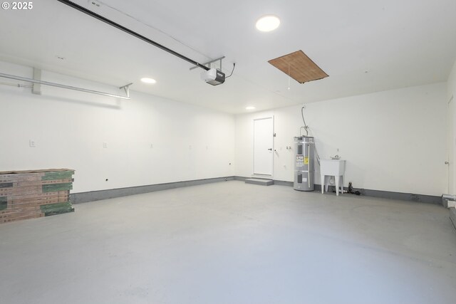 2817 Applewood Ln, Eugene, OR 97408 - garage featuring water heater, a garage door opener, and recessed lighting