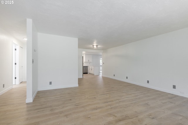 2817 Applewood Ln, Eugene, OR 97408 - unfurnished living room featuring light wood finished floors
