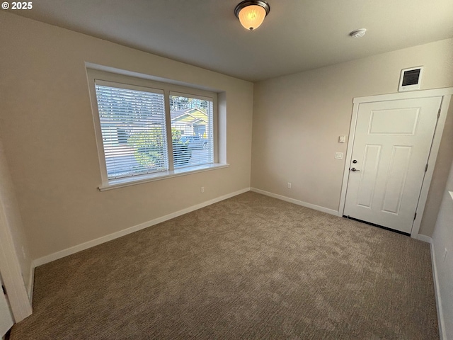 empty room with carpet floors