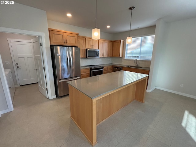 kitchen featuring backsplash, a center island, sink, hanging light fixtures, and appliances with stainless steel finishes