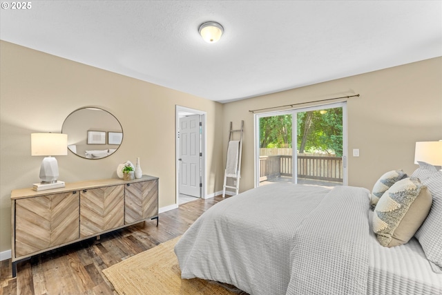6902 SW Taylors Ferry Rd, Portland, OR 97223 - bedroom featuring access to outside and wood finished floors
