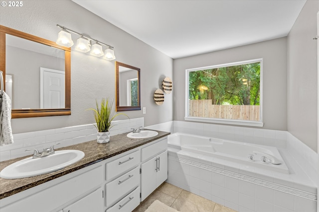 6902 SW Taylors Ferry Rd, Portland, OR 97223 - full bath with double vanity, a garden tub, and tile patterned flooring