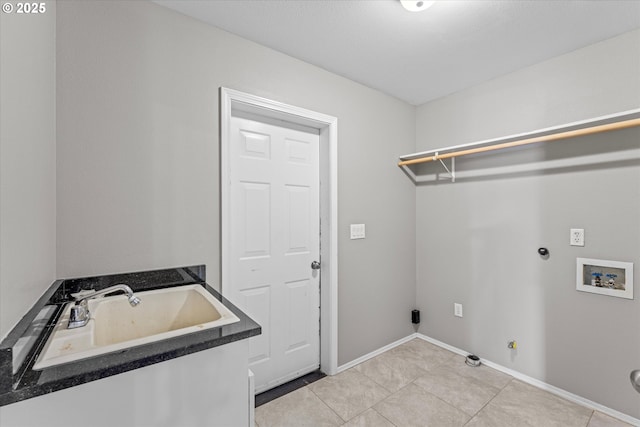 6902 SW Taylors Ferry Rd, Portland, OR 97223 - laundry room with hookup for a gas dryer, washer hookup, and light tile patterned floors