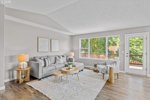 6902 SW Taylors Ferry Rd, Portland, OR 97223 - living room with lofted ceiling and wood finished floors