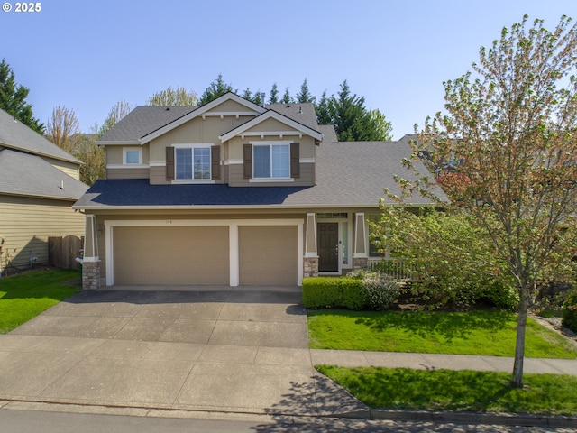 180 N The Greens Ave, Newberg, OR 97132 - craftsman-style home with a garage, stone siding, concrete driveway, and a shingled roof