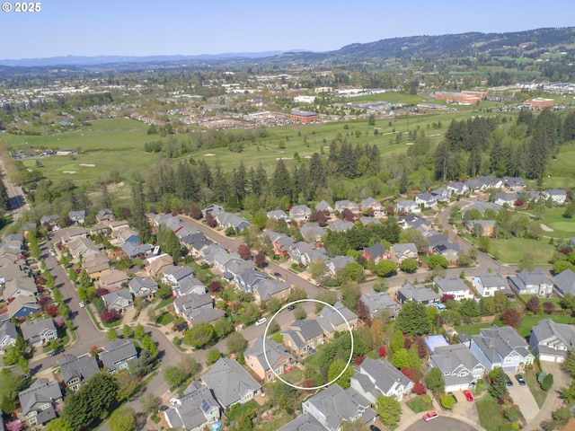 180 N The Greens Ave, Newberg, OR 97132 - aerial overview of property's location featuring nearby suburban area, mountains, and a golf club