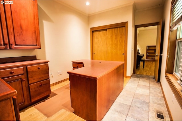 office with ornamental molding, light tile patterned floors, baseboards, and recessed lighting