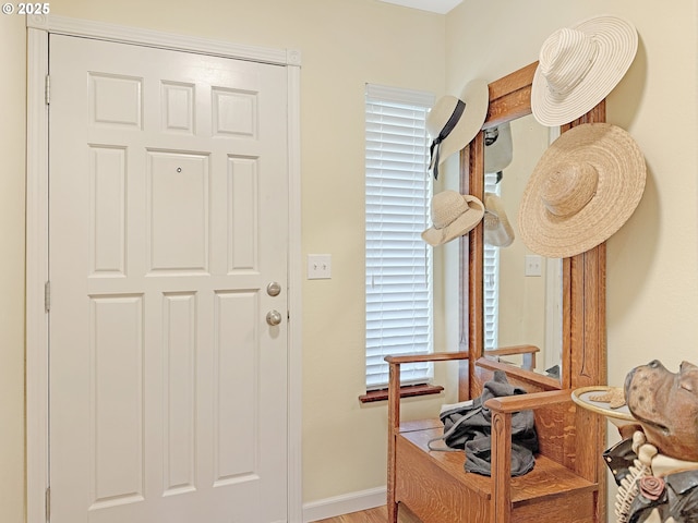 entryway featuring baseboards