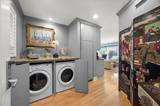 washroom featuring washer and clothes dryer, ornamental molding, laundry area, recessed lighting, and light wood-style floors