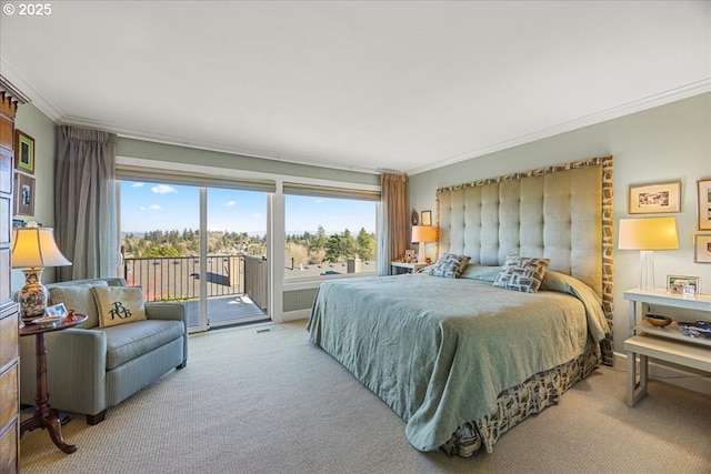 bedroom with multiple windows, crown molding, carpet flooring, and access to outside