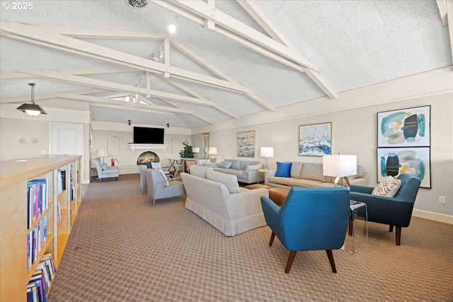 carpeted living room featuring vaulted ceiling with beams, baseboards, ceiling fan, a warm lit fireplace, and a textured ceiling