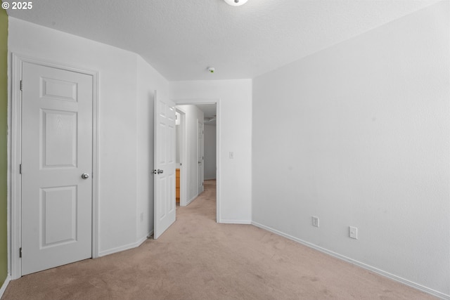 1938 27th Ave, Forest Grove, OR 97116 - unfurnished bedroom featuring light colored carpet and baseboards