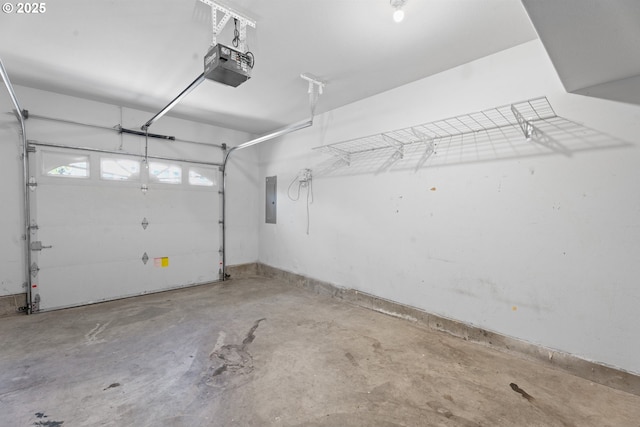 1938 27th Ave, Forest Grove, OR 97116 - garage with a garage door opener, electric panel, and baseboards