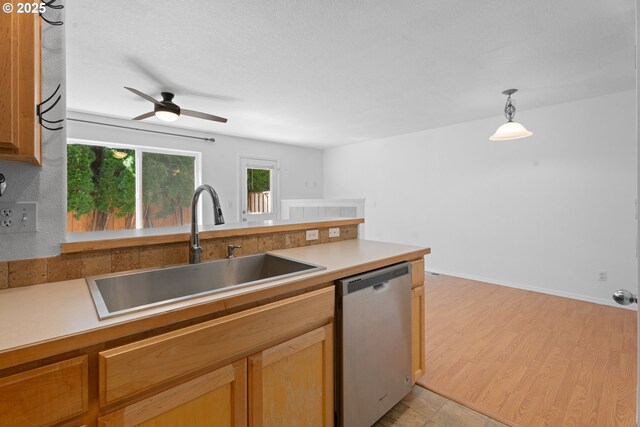 1938 27th Ave, Forest Grove, OR 97116 - kitchen featuring dishwasher, a sink, ceiling fan, light countertops, and decorative light fixtures