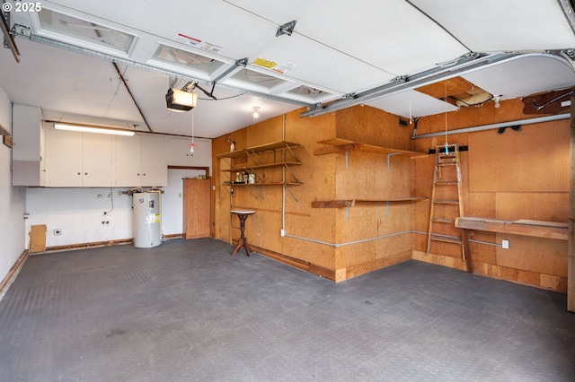 garage featuring water heater and a garage door opener