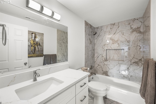 bathroom with toilet, shower / tub combination, visible vents, and vanity