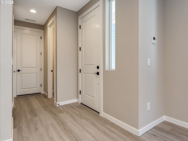 702 NW 178th Way, Ridgefield, WA 98642 - foyer entrance with baseboards, light wood-style flooring, and recessed lighting