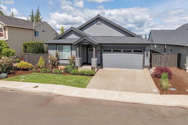 1332 SE 14th Ave, Canby, OR 97013 - view of front of home featuring an attached garage, driveway, and roof with shingles