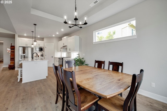 1332 SE 14th Ave, Canby, OR 97013 - dining room with recessed lighting, a chandelier, light wood-style flooring, and baseboards