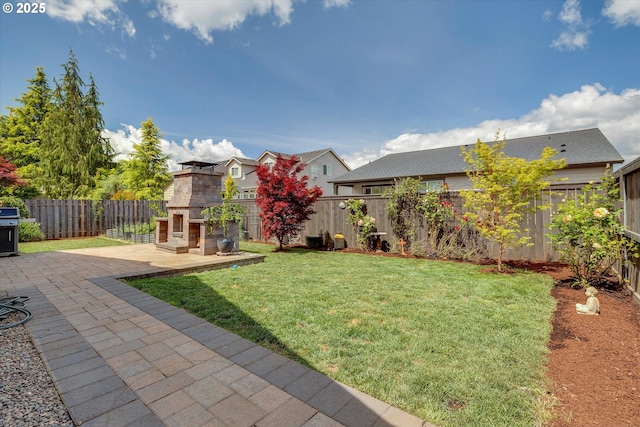 1332 SE 14th Ave, Canby, OR 97013 - view of yard with exterior fireplace, a patio, and a residential view