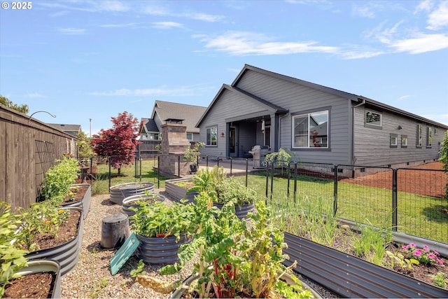 1332 SE 14th Ave, Canby, OR 97013 - view of front of house featuring a vegetable garden and crawl space