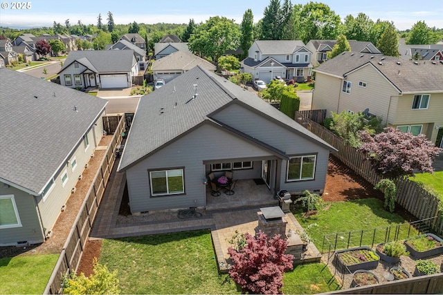 1332 SE 14th Ave, Canby, OR 97013 - back of house featuring a vegetable garden, a residential view, and a patio area